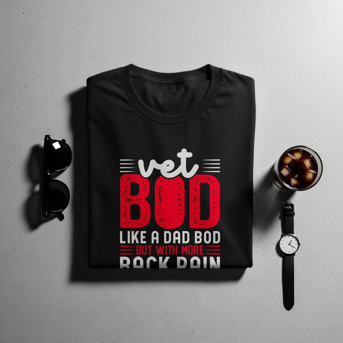 Black t-shirt with text "vet BOD LIKE A DAD BOD BUT WITH MORE ROCK DAIN".