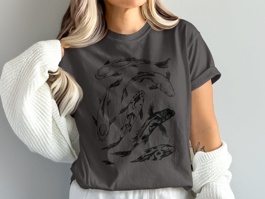 Charcoal t-shirt with a black ink drawing of five koi fish swimming in a circle.