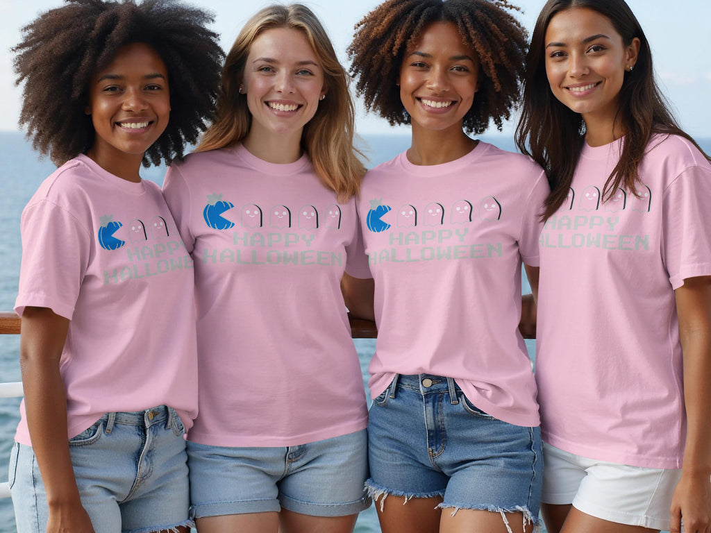 Four women wear pink t-shirts with "Happy Halloween" and ghost graphic.