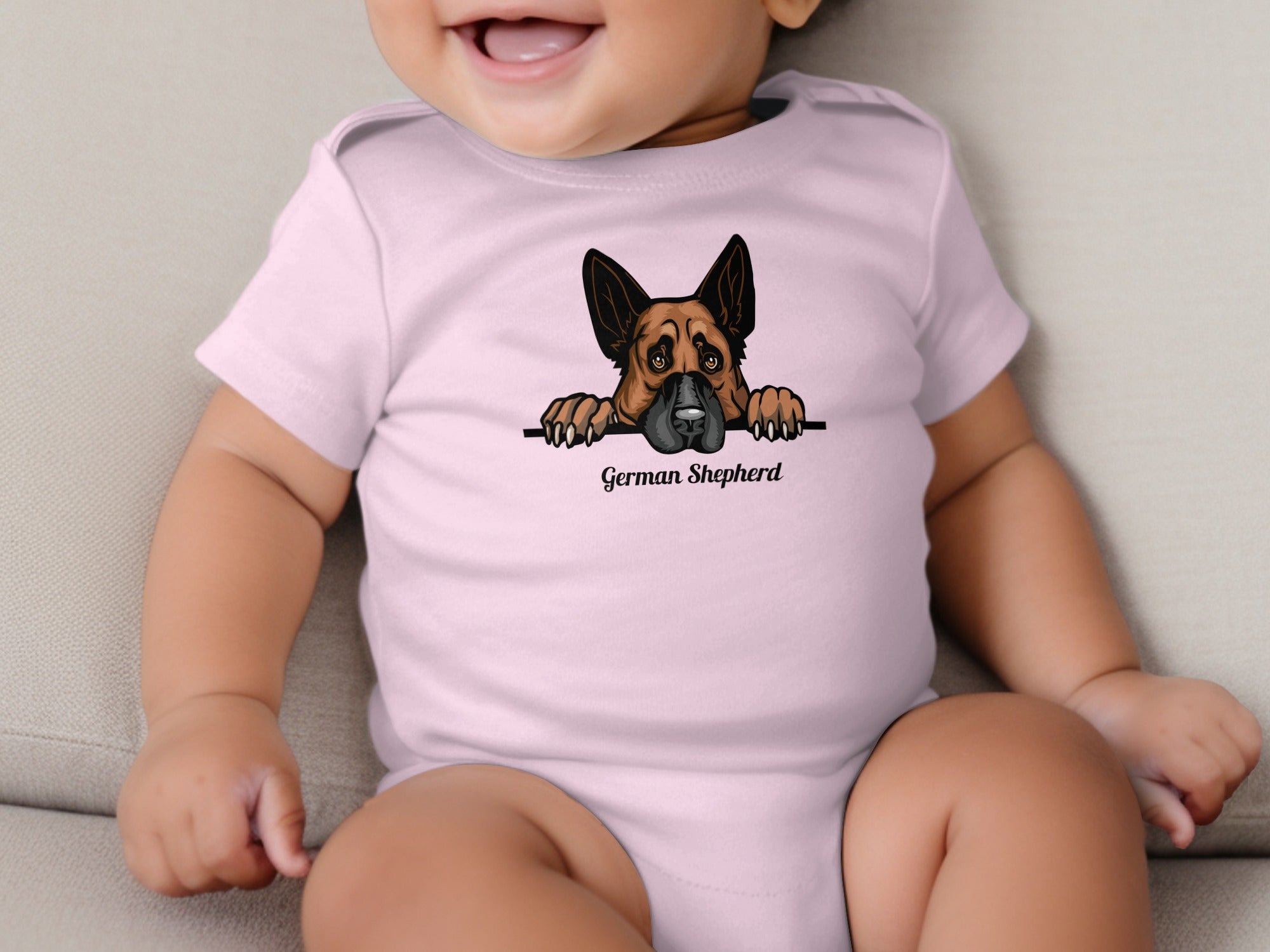Pink baby onesie with a peeking German Shepherd graphic and text.