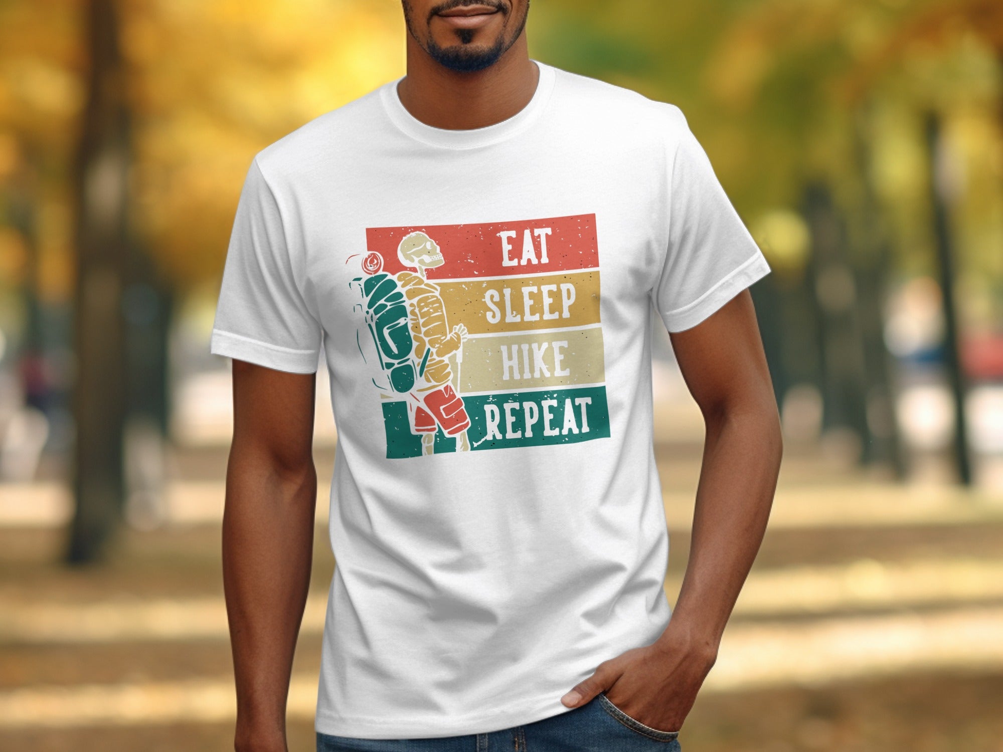 White t-shirt with skeleton graphic and text: Eat, Sleep, Hike, Repeat.