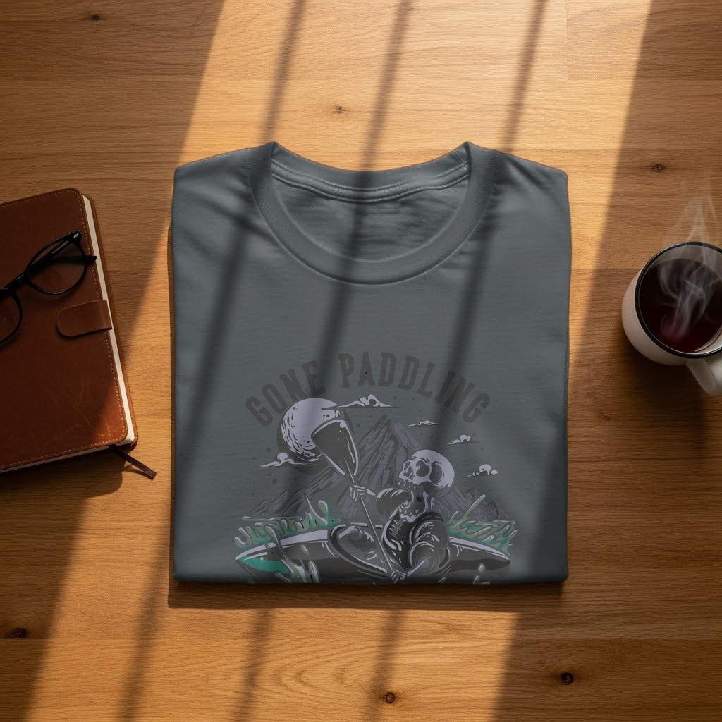 Gray t-shirt with skeleton kayaking design and "Gone Paddling" text.