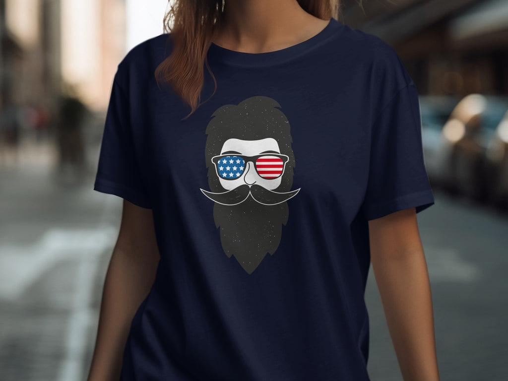 Dark blue t-shirt with graphic of beard, mustache, and American flag sunglasses