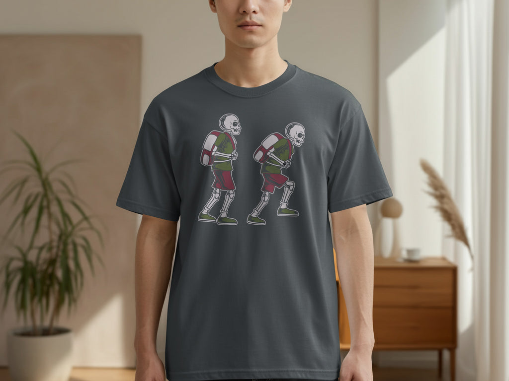 Dark gray t-shirt with a graphic of two walking skeletons wearing backpacks.