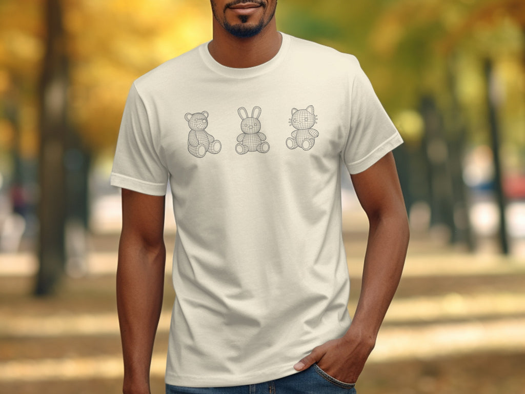 Cream t-shirt with wireframe teddy bear, rabbit, and cat graphics on chest.