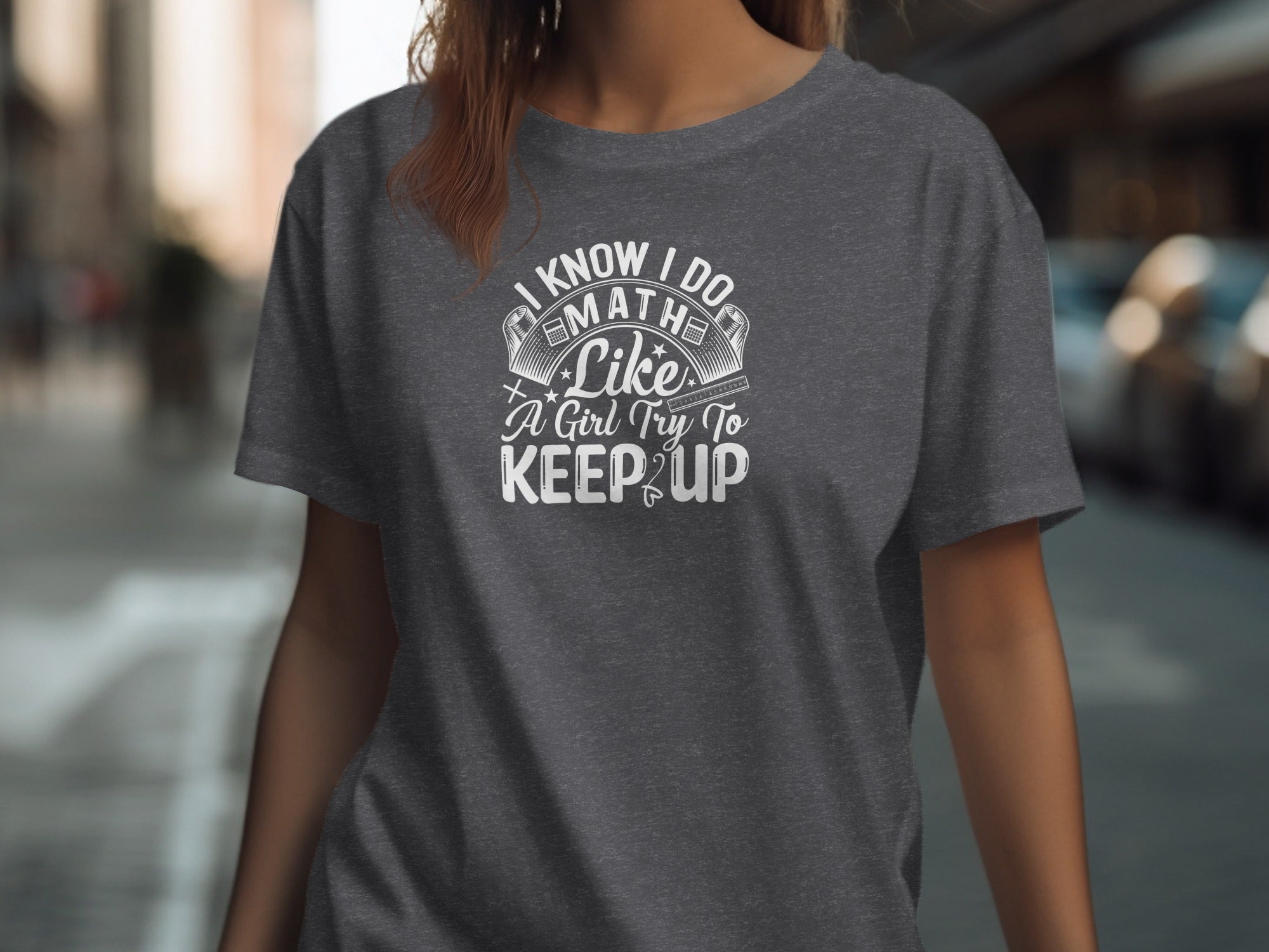 Dark grey t-shirt with text: "I know I do math like a girl try to keep up."