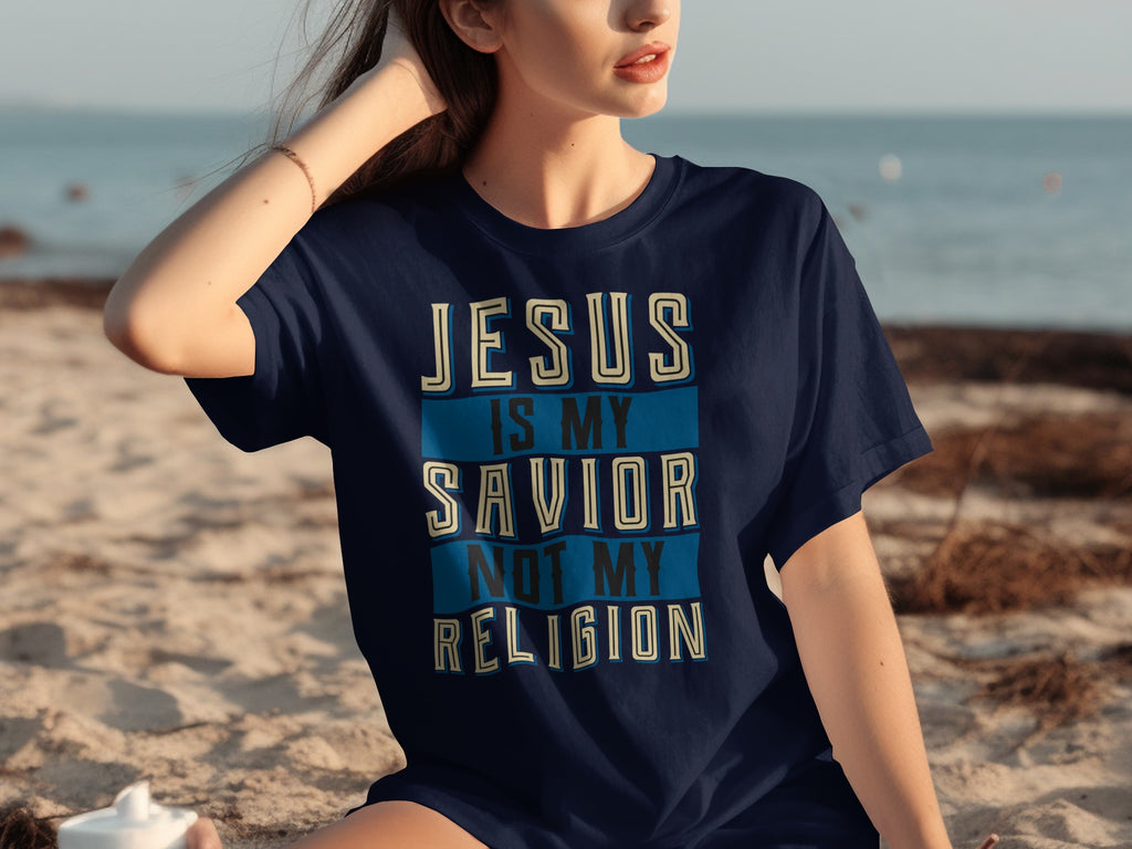 Dark blue t-shirt with text: Jesus is my savior, not my religion.