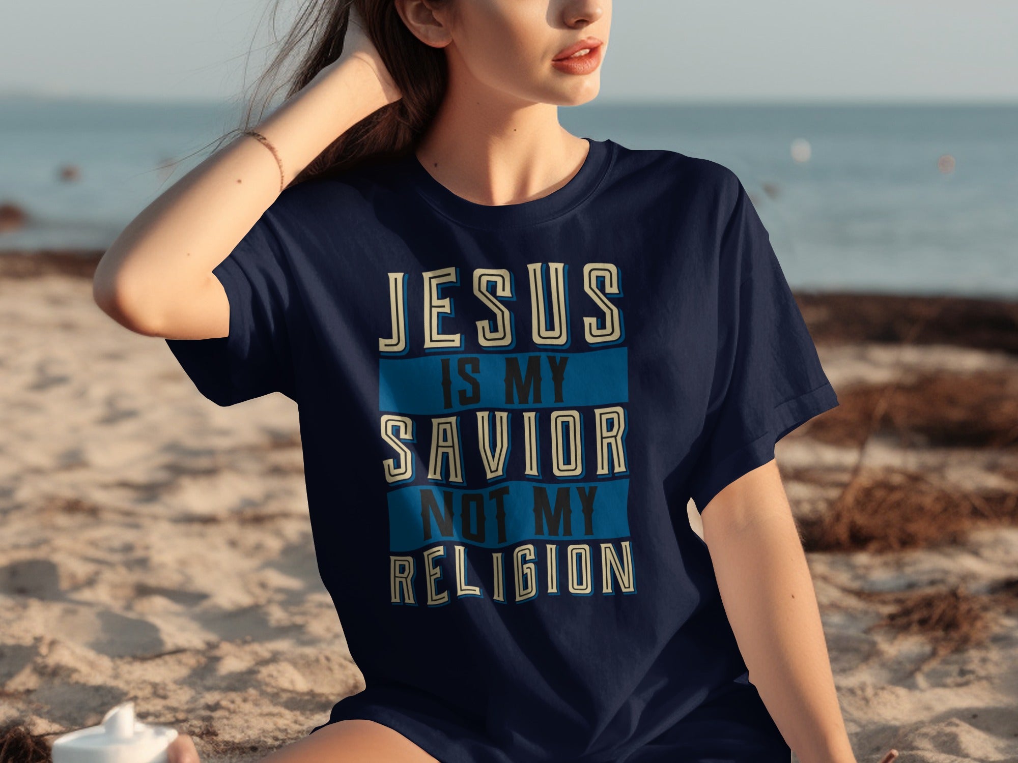 Dark blue t-shirt with text: Jesus is my savior, not my religion.