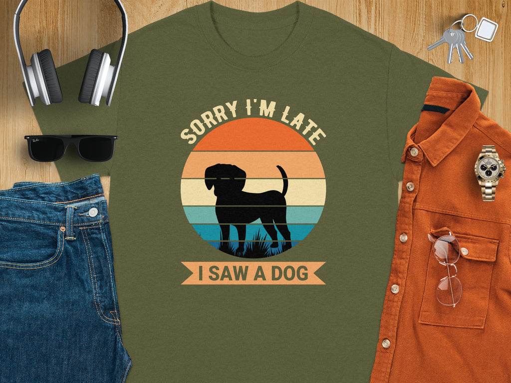 Green t-shirt with dog silhouette and text "SORRY I'M LATE I SAW A DOG".
