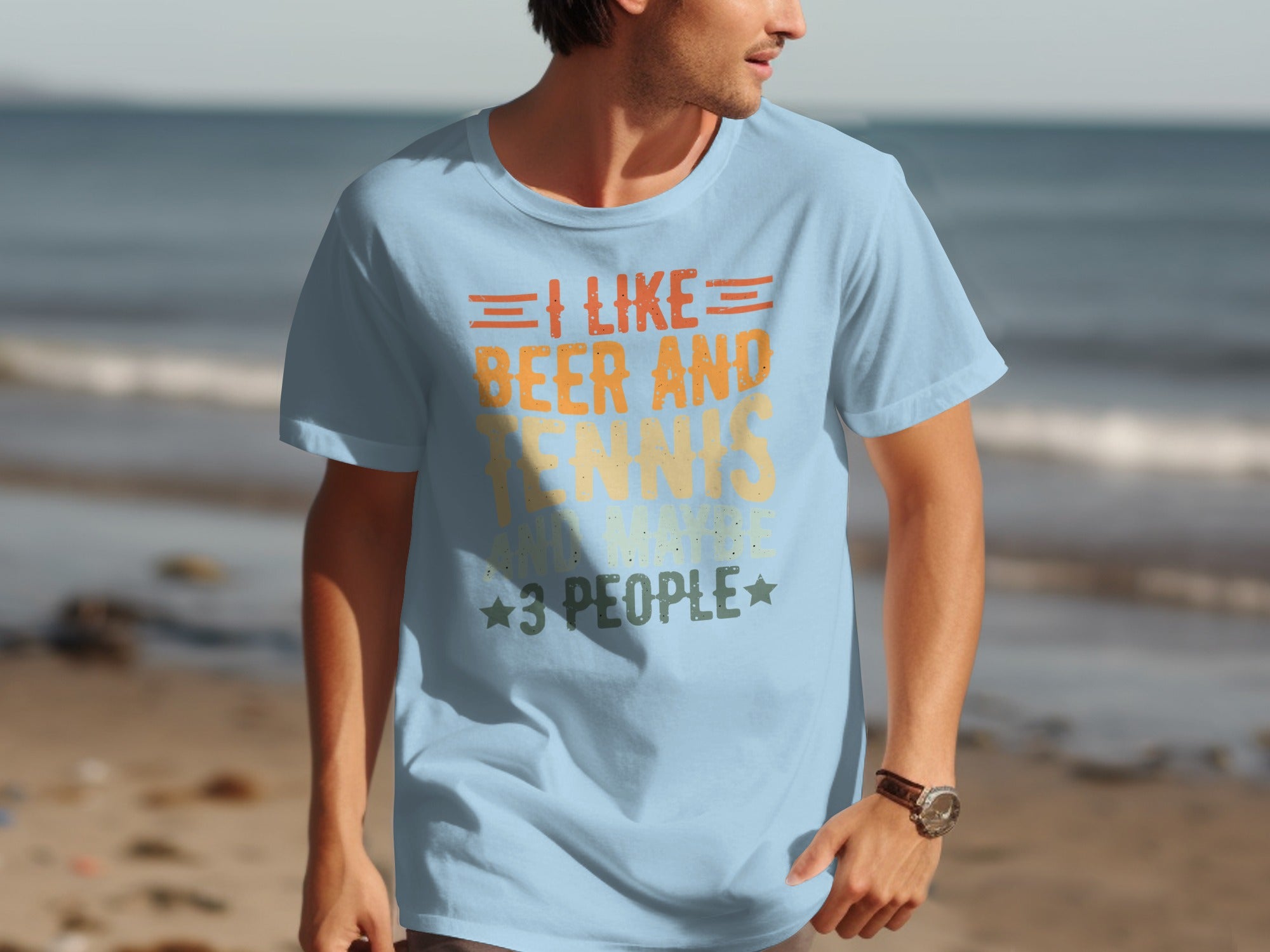Light blue t-shirt with text "I like beer and tennis and maybe 3 people".
