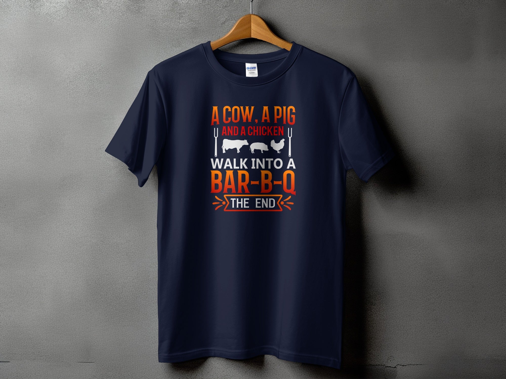 Navy t-shirt with text "A cow, a pig and a chicken walk into a bar-b-q the end".