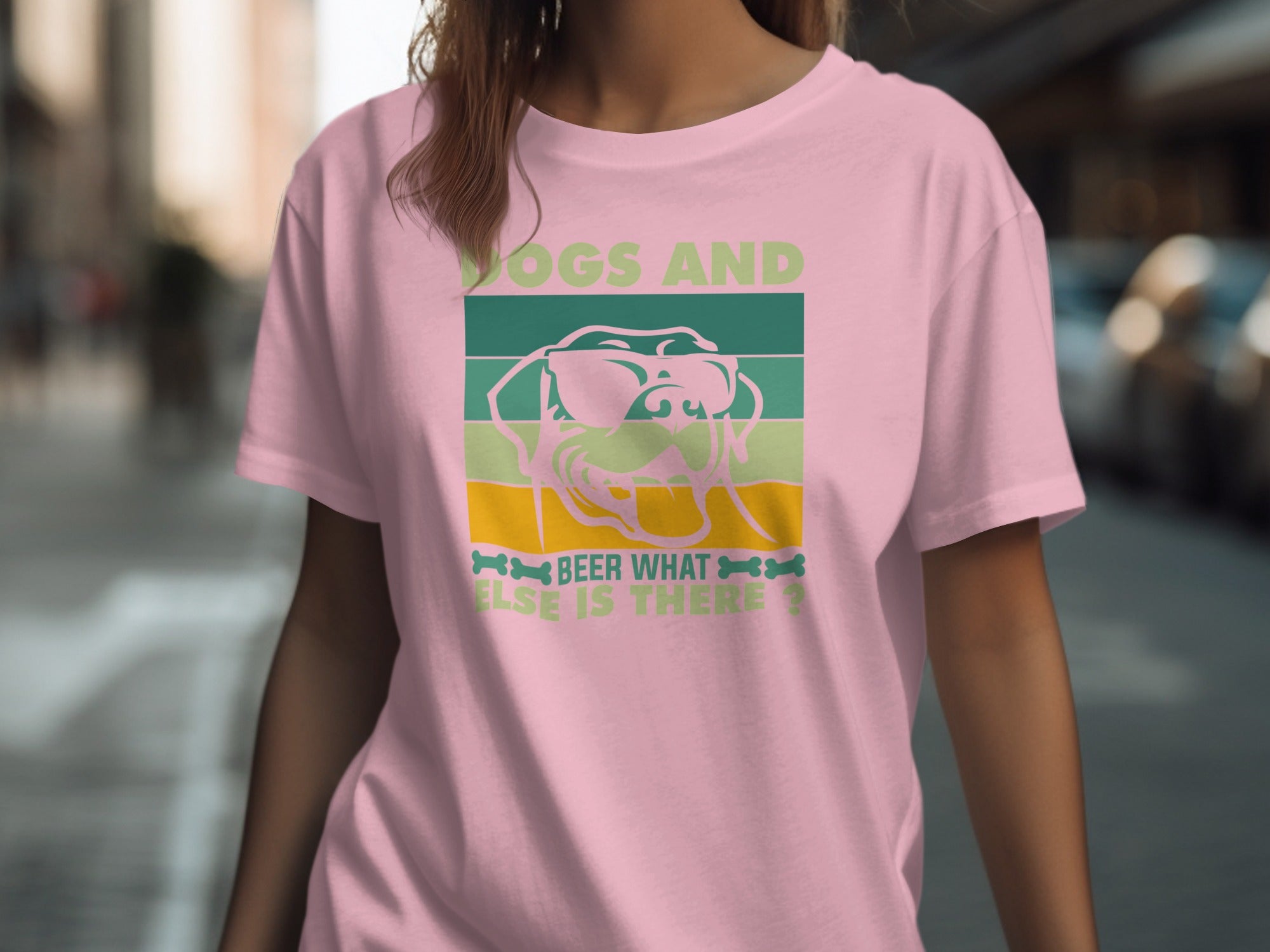 Pink t-shirt with "Dogs and beer what else is there?" graphic.