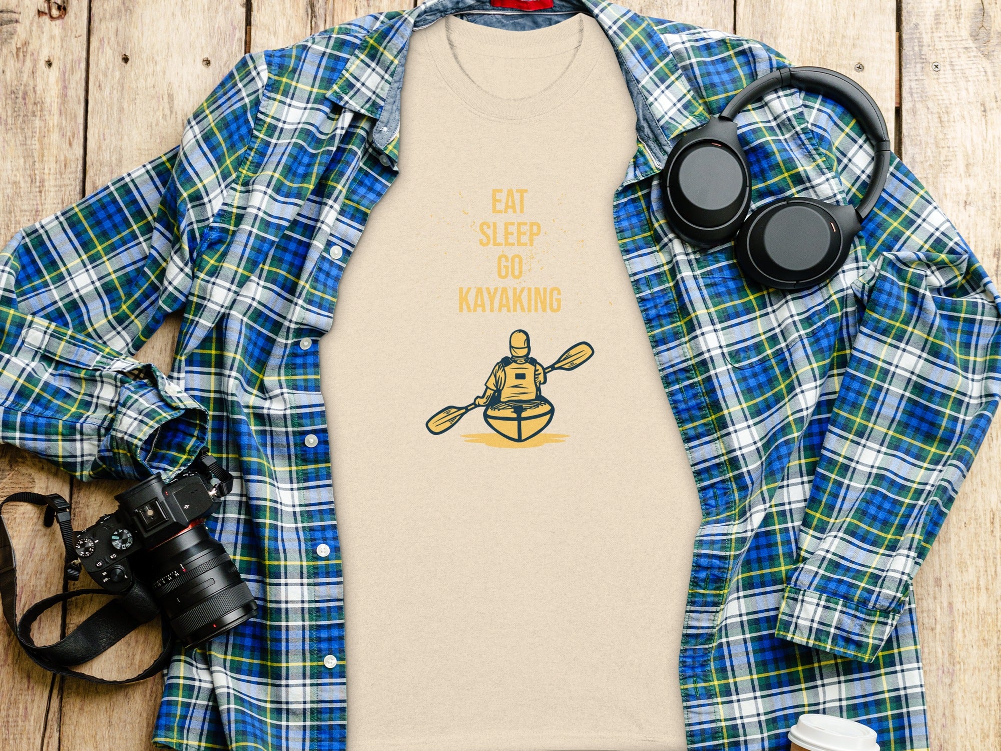T-shirt with "Eat Sleep Go Kayaking" text and graphic of kayaker.
