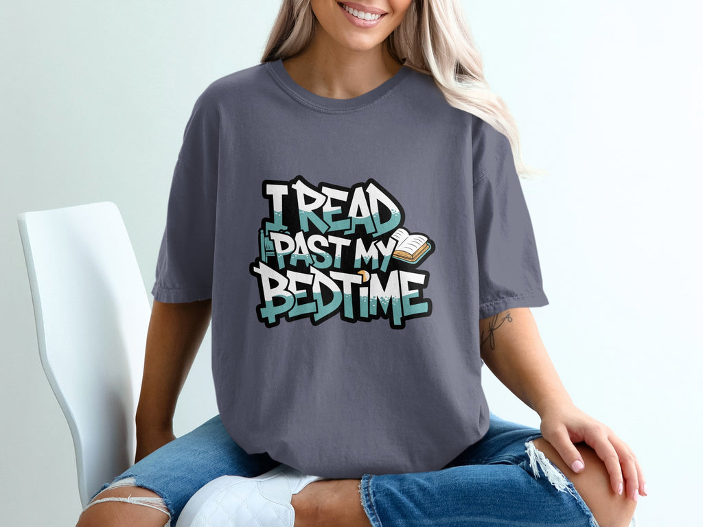 Graphic t-shirt with "I read past my bedtime" text and an open book.