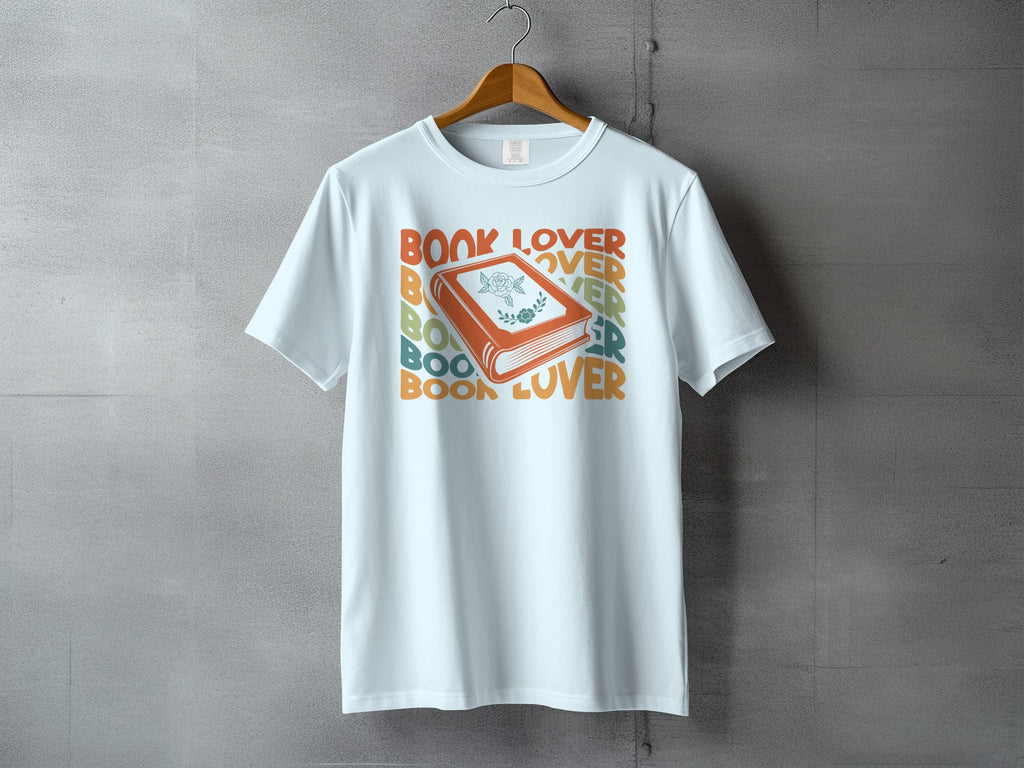 Light blue t-shirt with "Book Lover" text and a decorated book graphic.