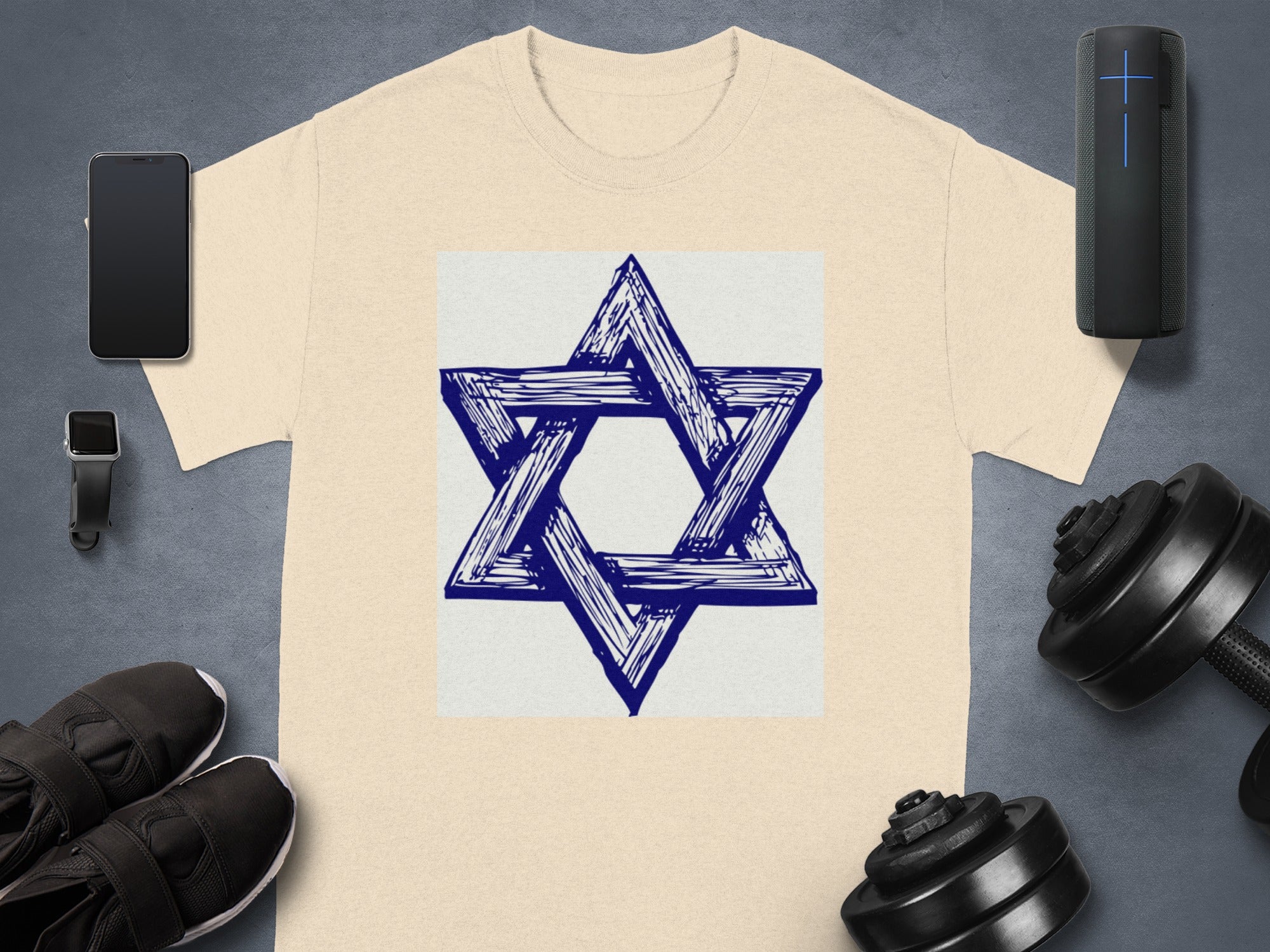 Cream t-shirt with blue sketched Star of David graphic on gray background.