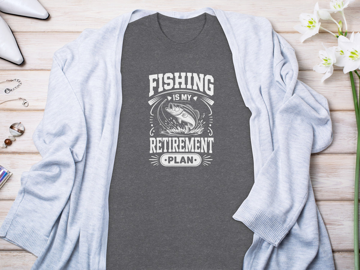 Dark gray t-shirt with white text and graphic: Fishing is my retirement plan.