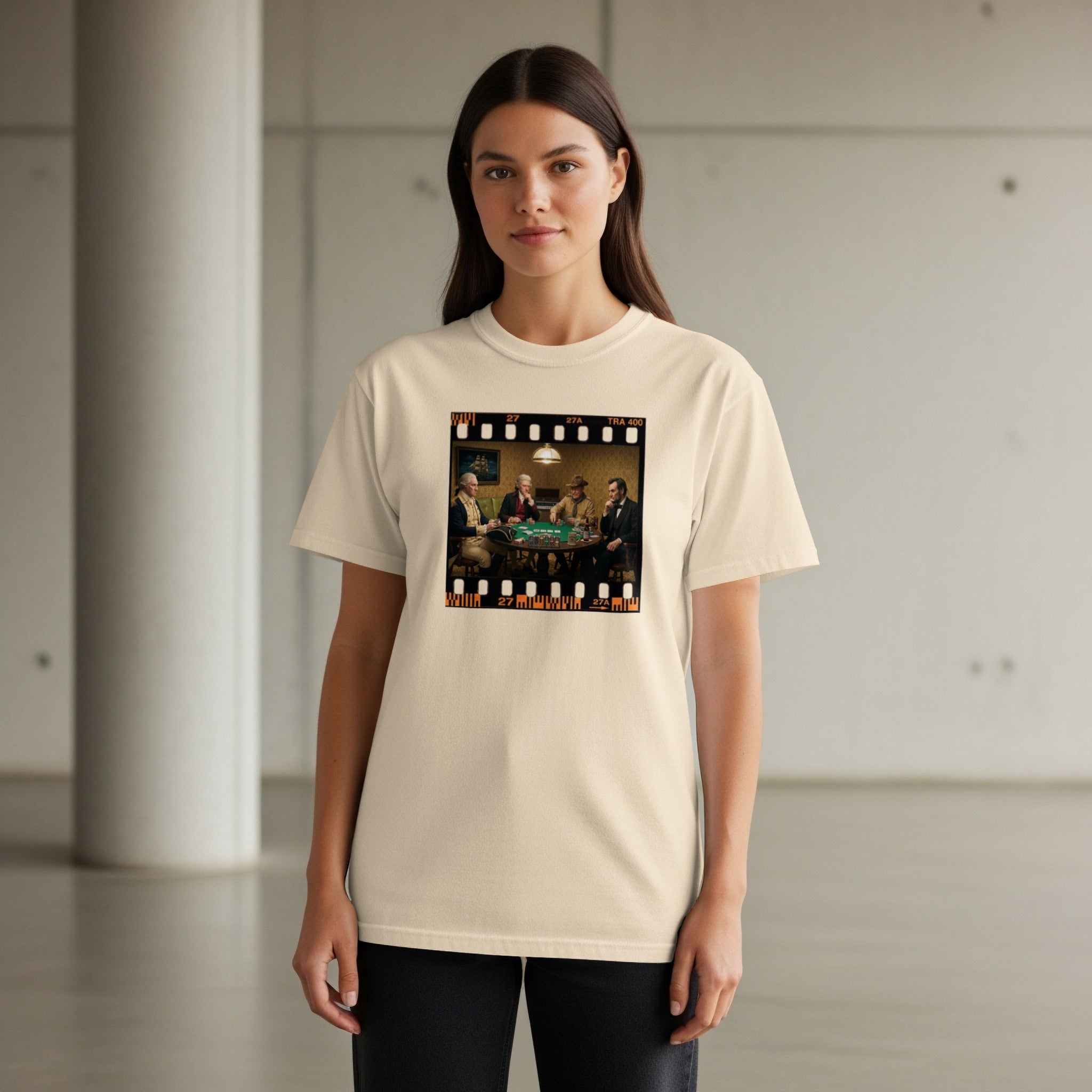 U.S. Presidents play poker in a filmstrip design on a light cream t-shirt.