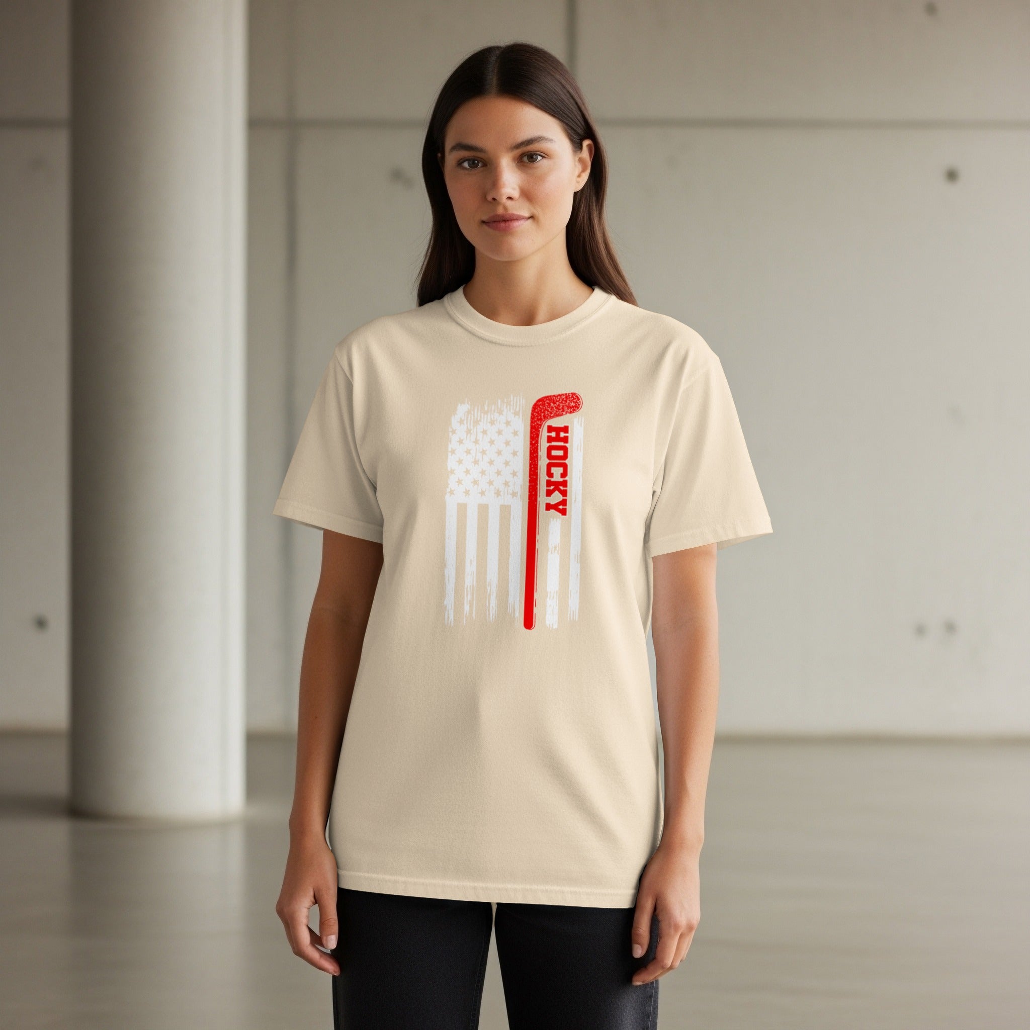 Cream t-shirt with distressed American flag and red hockey stick graphic.