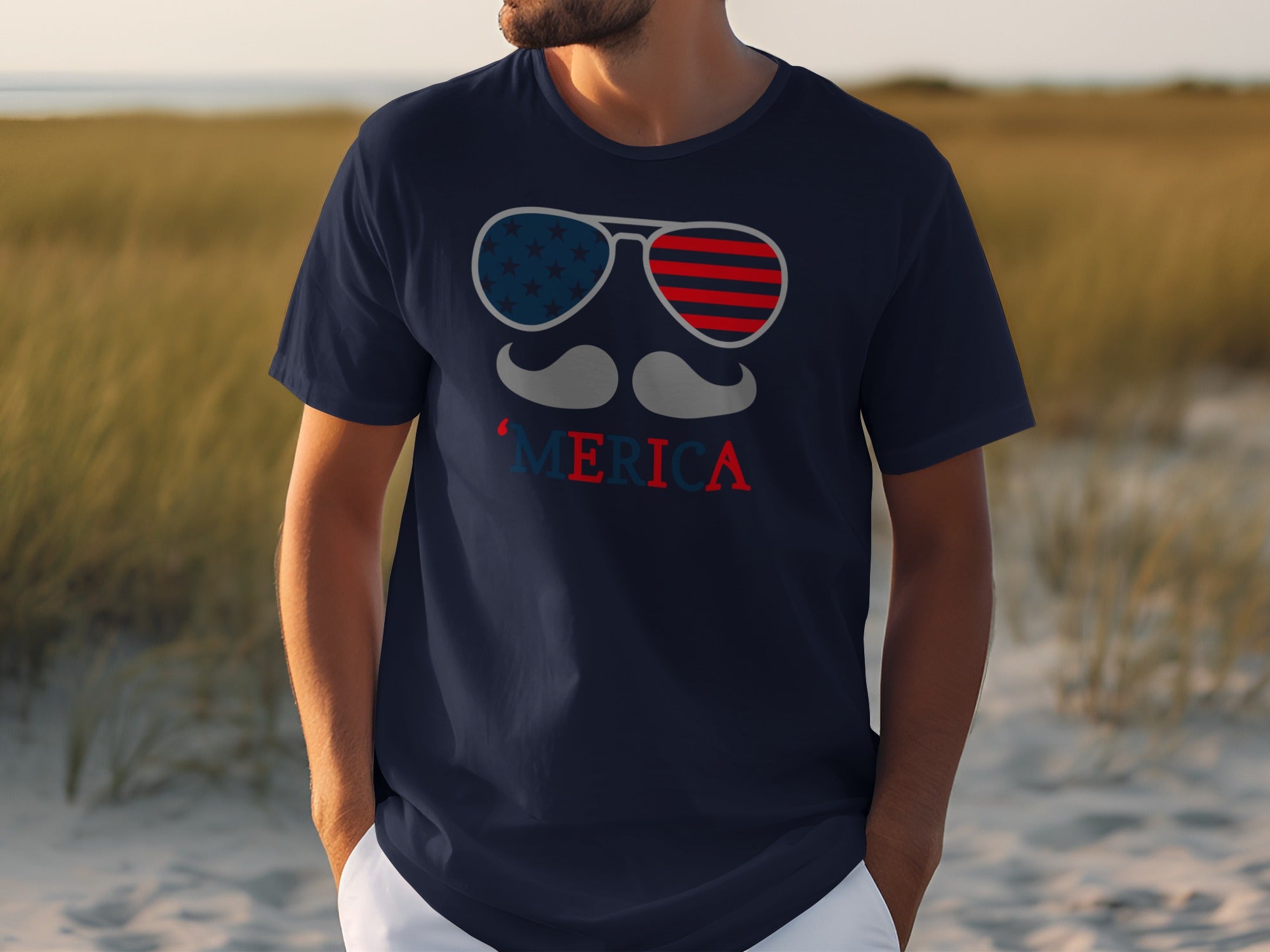 Navy t-shirt with sunglasses, mustache, and "Merica" text in American flag design.