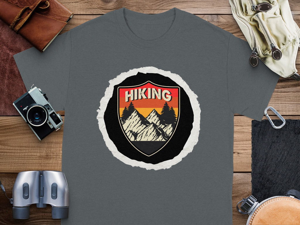 Dark gray t-shirt with a circular hiking graphic featuring mountains and trees