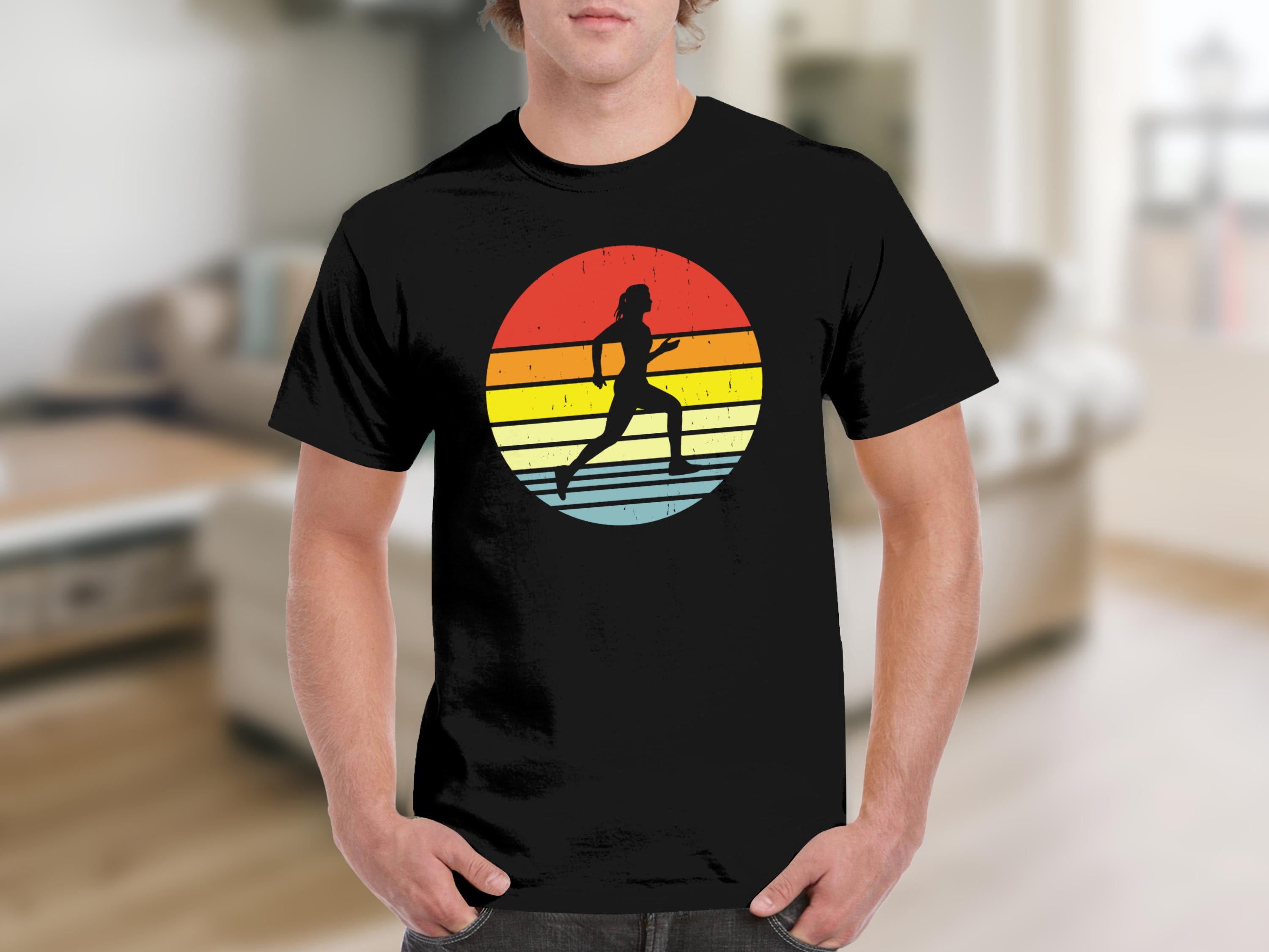 Black t-shirt with a silhouette of a woman running in a retro sunset design.