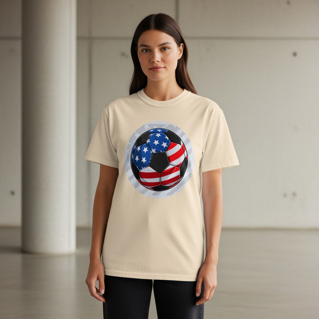 Cream t-shirt with a soccer ball graphic decorated with the American flag.
