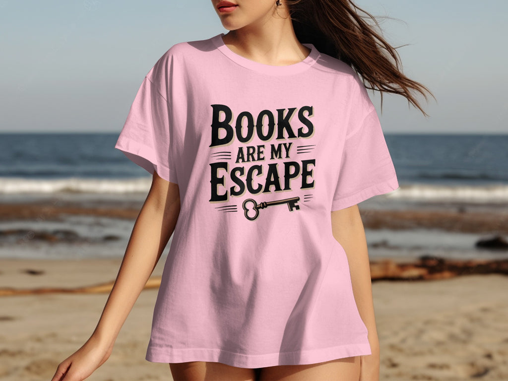 Pink t-shirt with "BOOKS ARE MY ESCAPE" text and a key graphic.