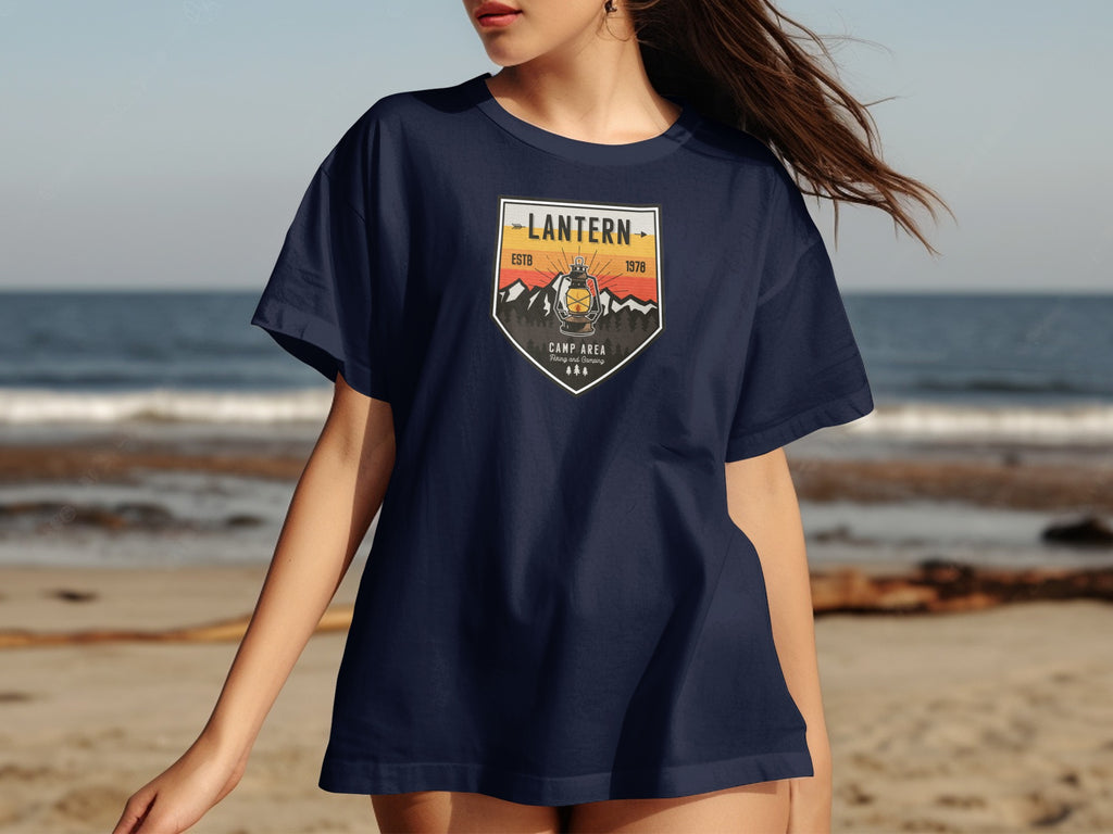 Navy t-shirt with a "Lantern Camp Area" emblem featuring a lantern and mountains.