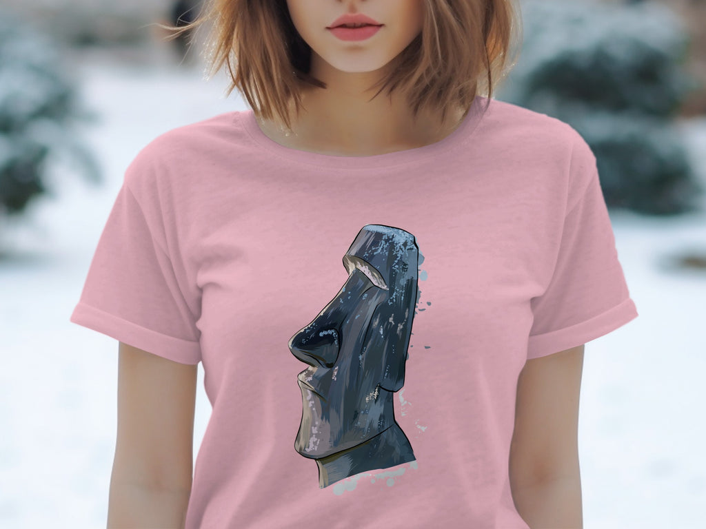 Pink t-shirt with a watercolor illustration of a Moai statue.