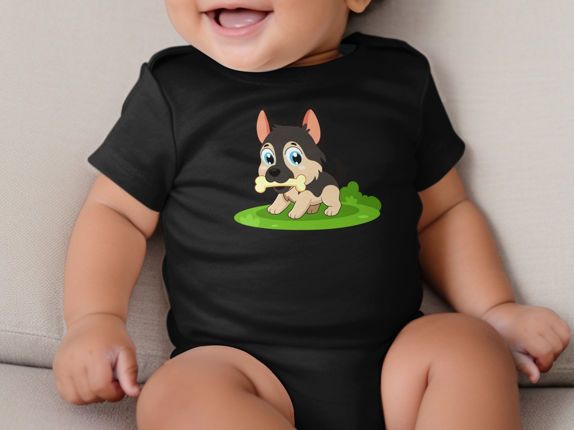 Black baby onesie with cartoon German Shepherd puppy holding a bone.