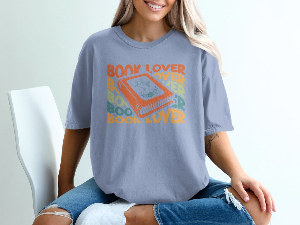 Shirt with orange book graphic and "BOOK LOVER" text.