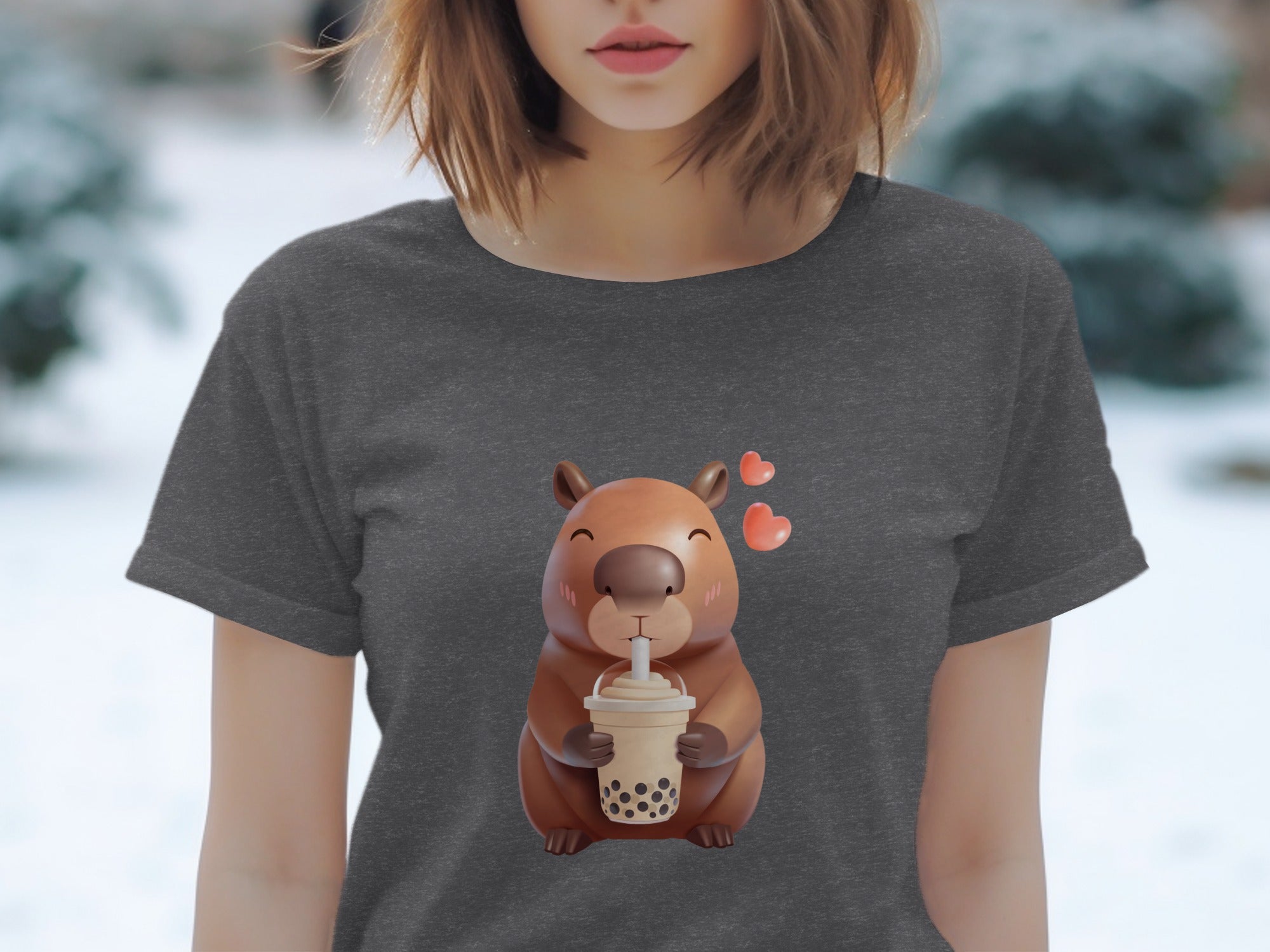 Capybara drinking bubble tea with hearts on a dark grey t-shirt.