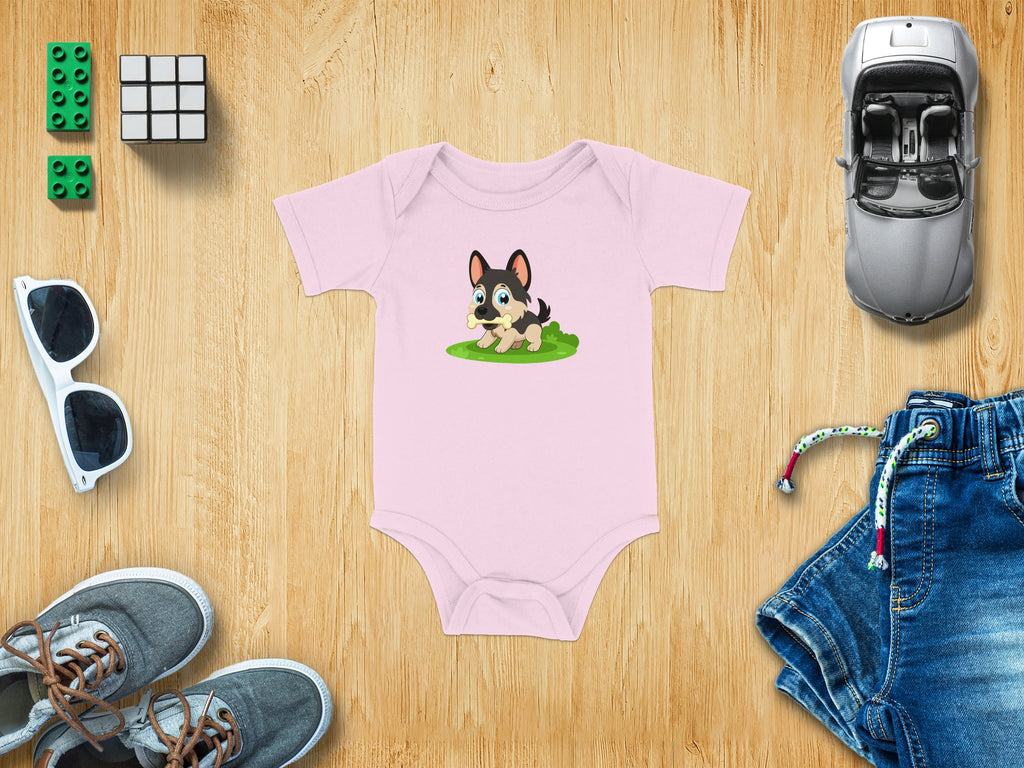 Pink baby onesie with cartoon dog graphic.