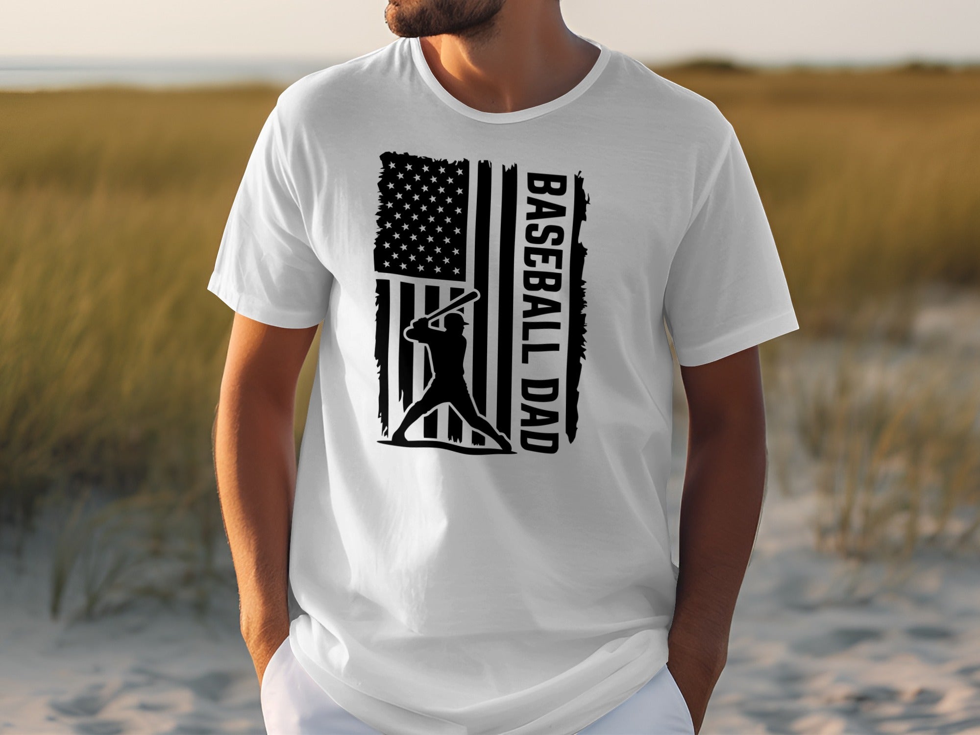 White t-shirt with black distressed American flag and baseball player graphic.