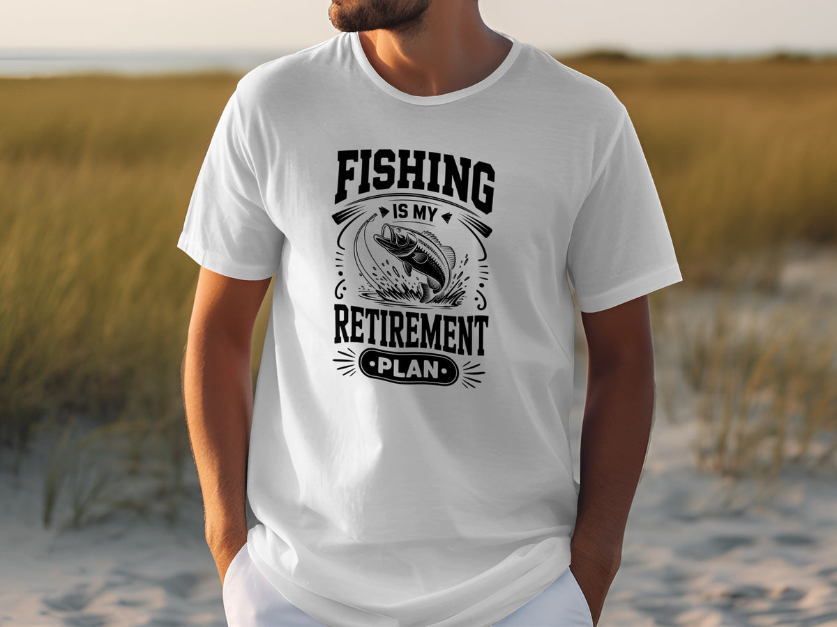 White t-shirt with black text "FISHING IS MY RETIREMENT PLAN" and a jumping fish.