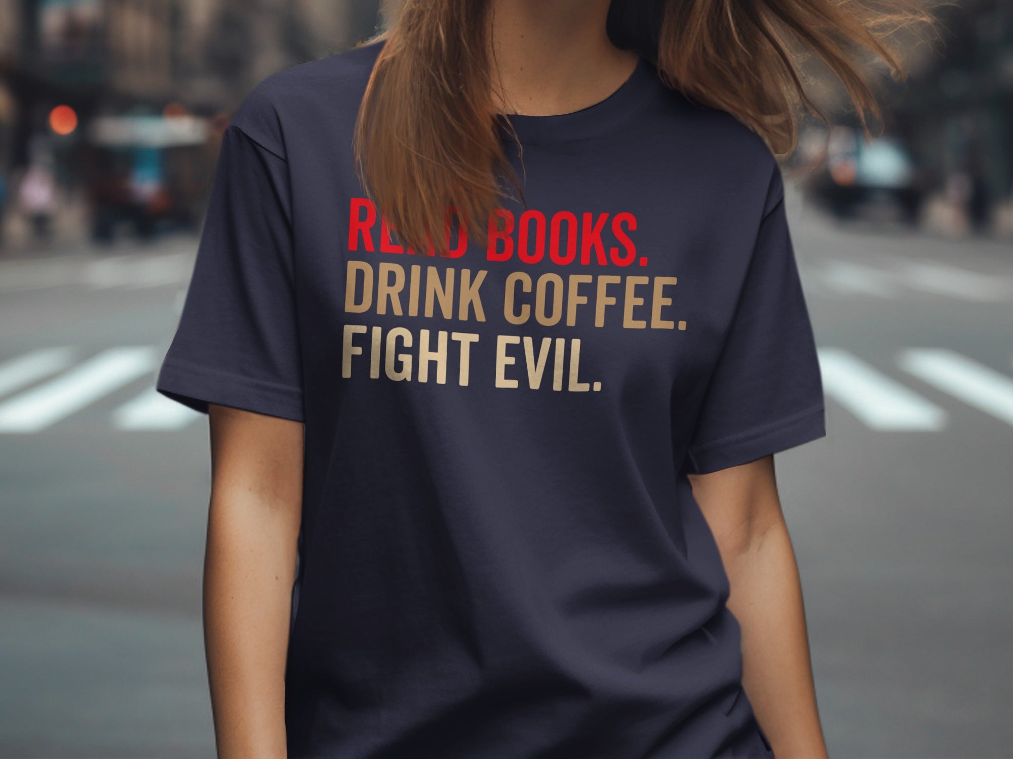 Dark navy t-shirt with "Read Books. Drink Coffee. Fight Evil." text.
