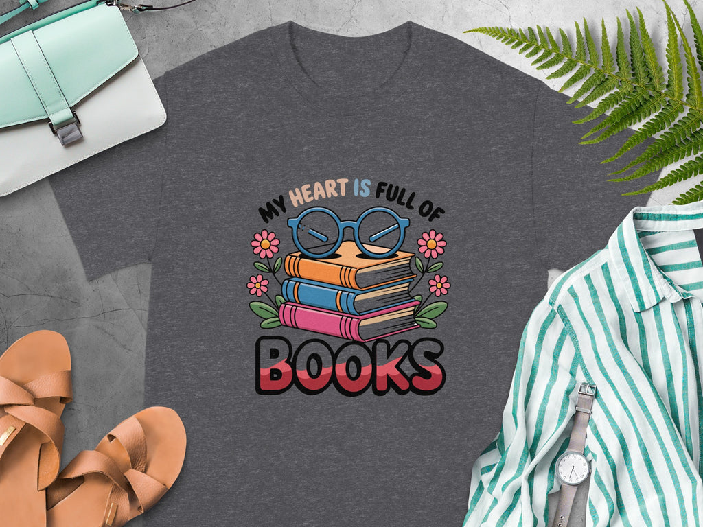 "My Heart Is Full of Books" text with stacked books and glasses graphic on t-shirt.