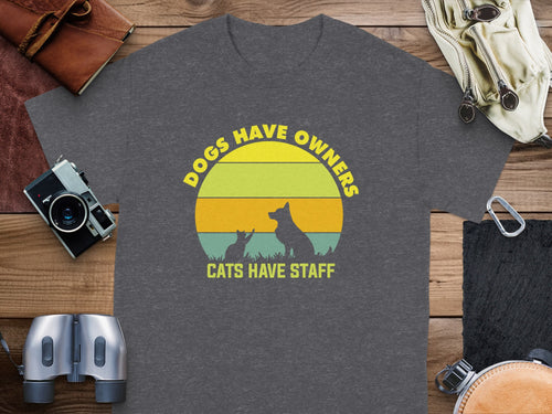 T-shirt with "Dogs Have Owners, Cats Have Staff" text and animal silhouettes.