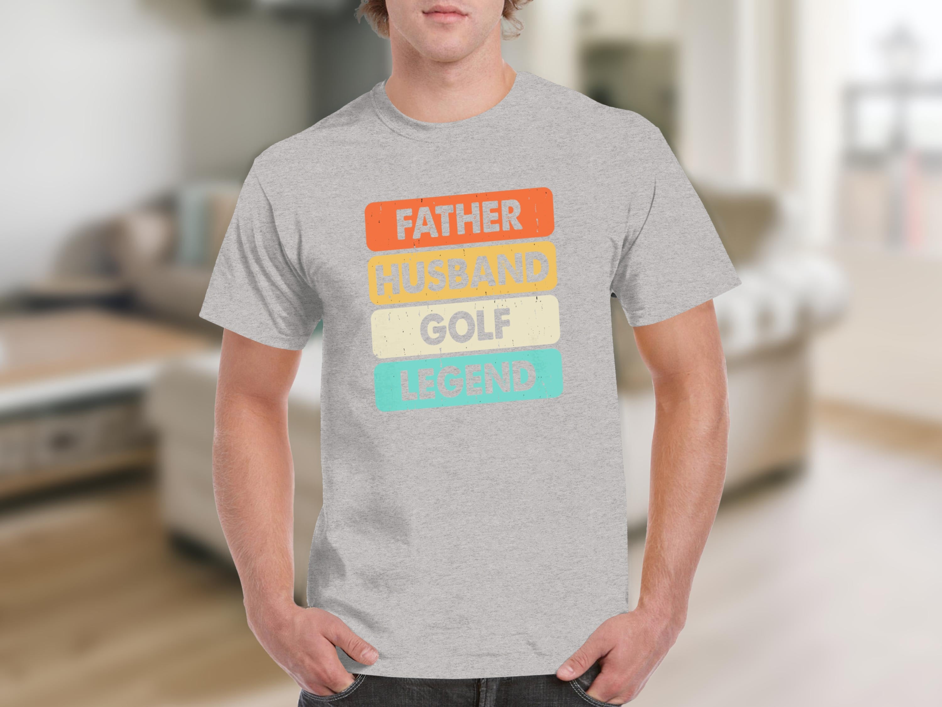 Gray t-shirt with "FATHER HUSBAND GOLF LEGEND" text in colorful blocks.