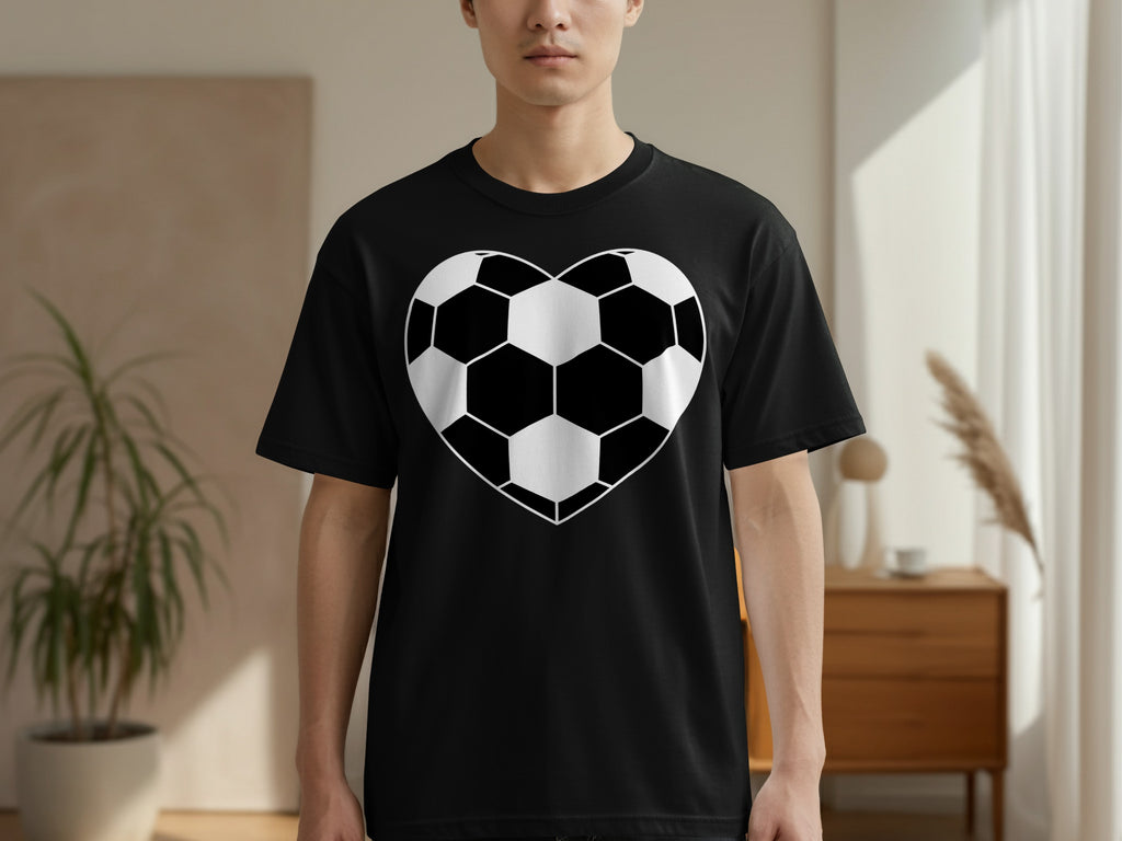 Black t-shirt with a white heart-shaped soccer ball graphic on the chest.