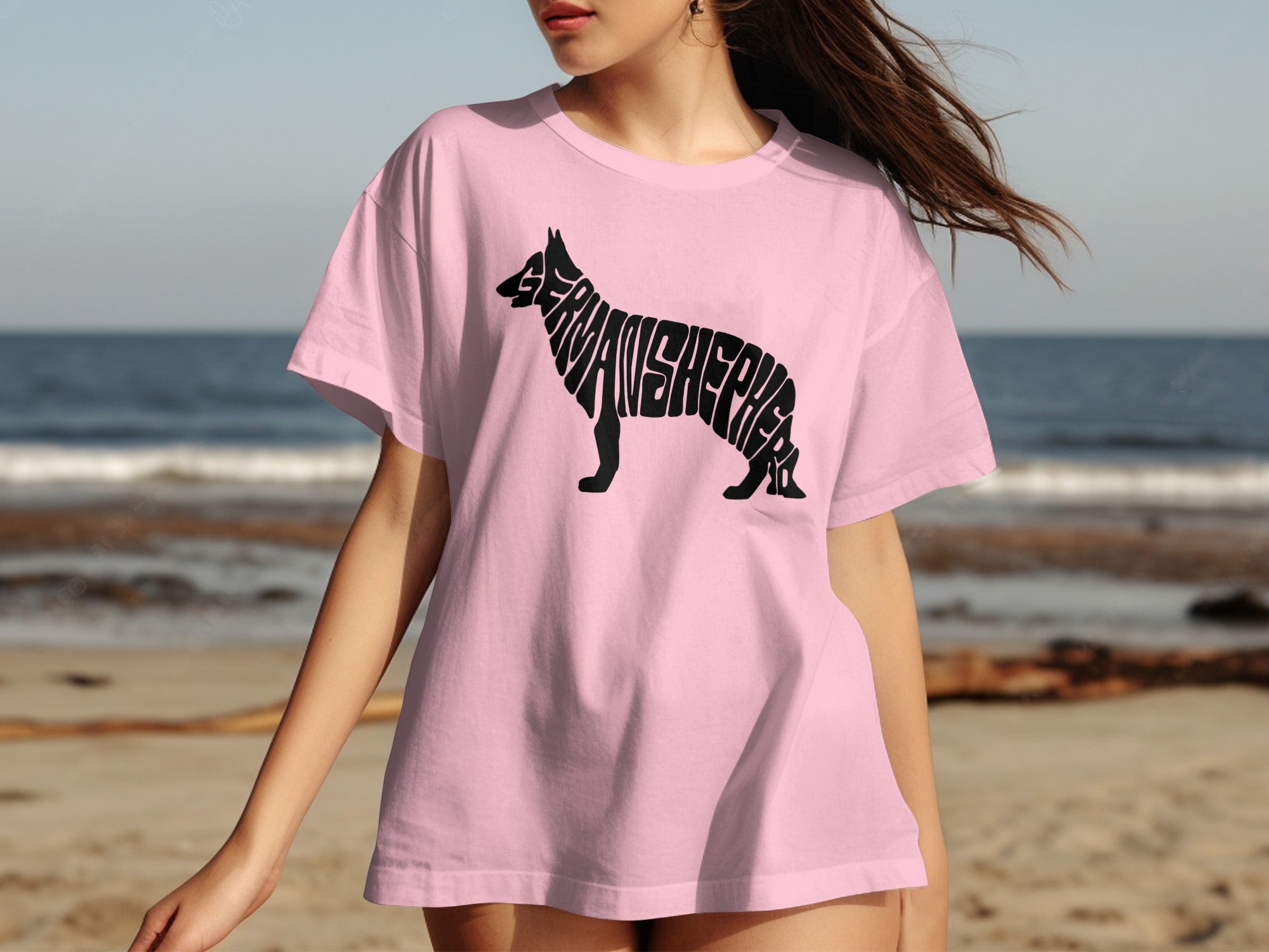 Pink t-shirt with black German Shepherd silhouette made of text.