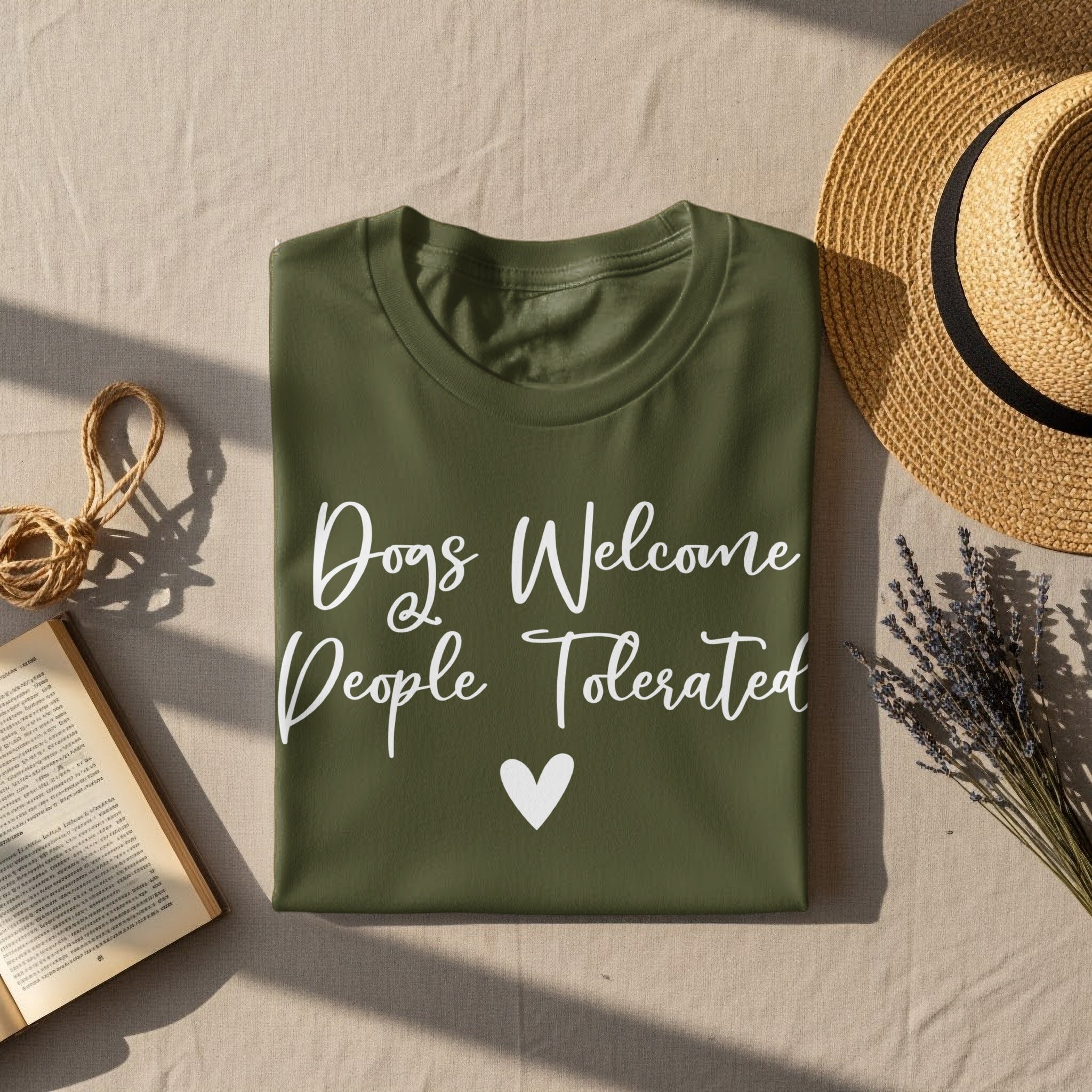 Olive green t-shirt with white text "Dogs Welcome People Tolerated" and a heart.