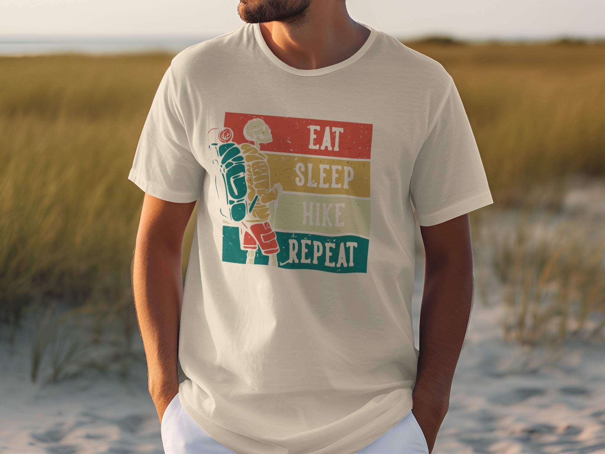 T-shirt with graphic: skeleton hiker, eat sleep hike repeat.