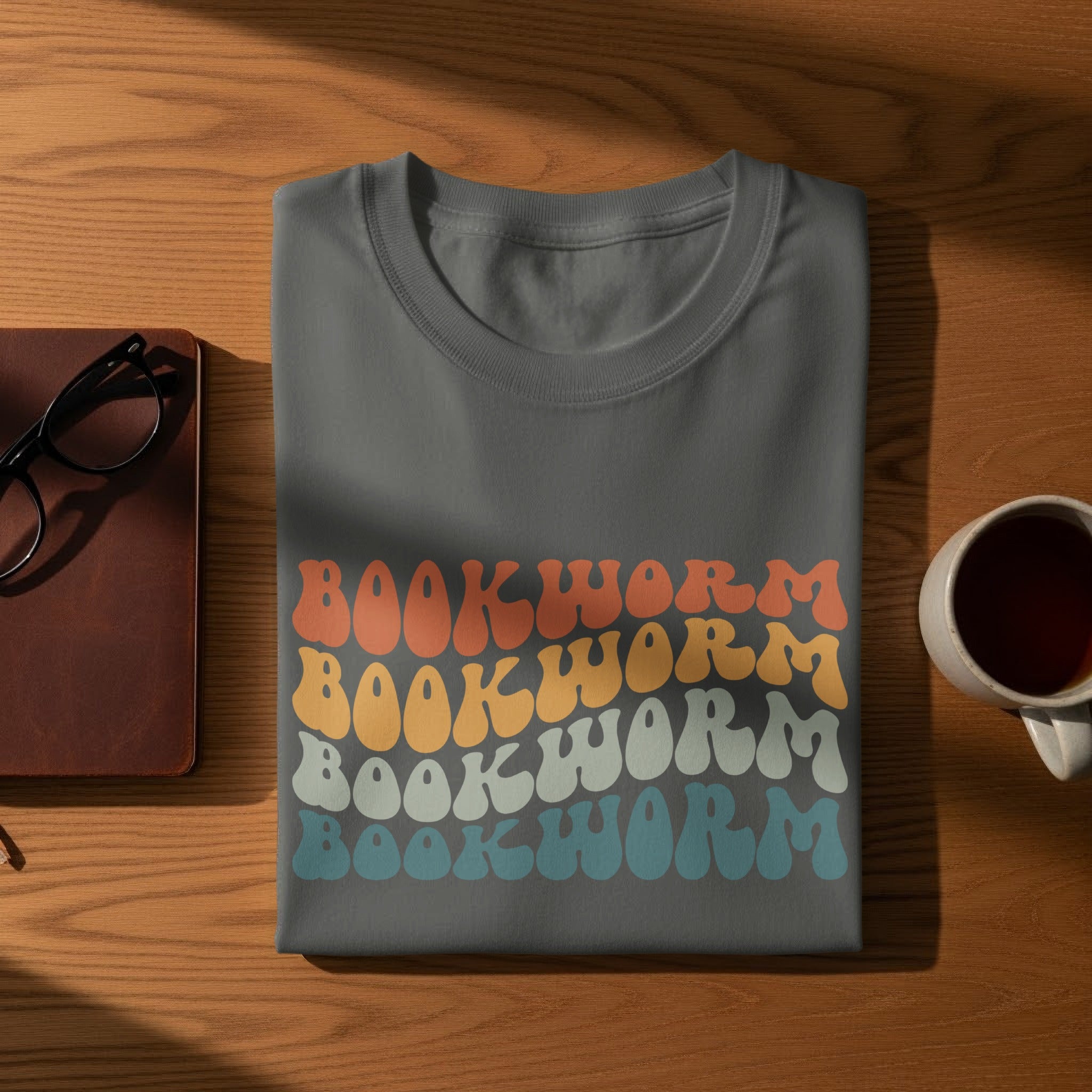 Grey t-shirt with "BOOKWORM" in colorful wavy text.