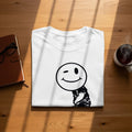 White t-shirt with a black wink smiley face graphic design.