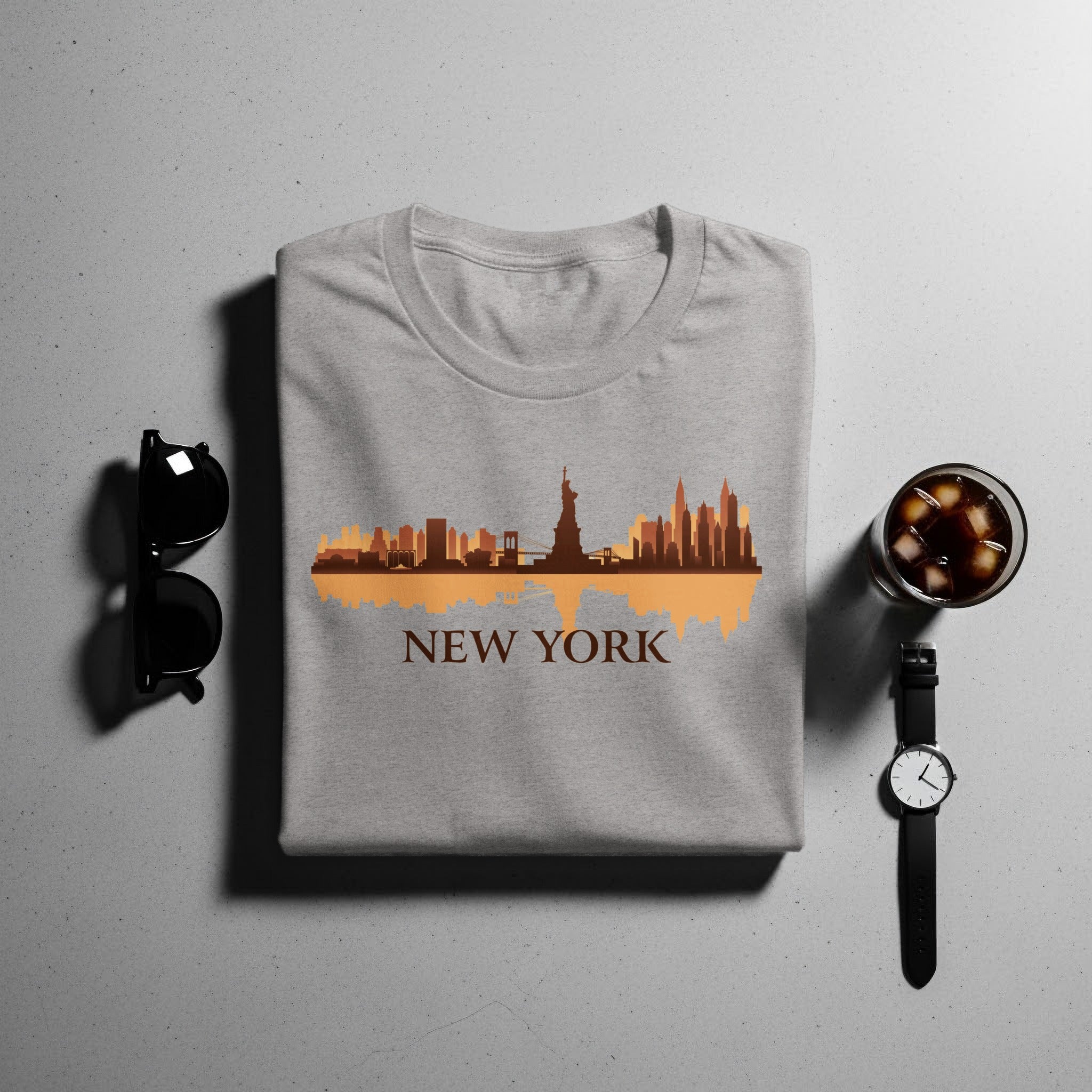 Grey t-shirt with a New York skyline graphic and text.
