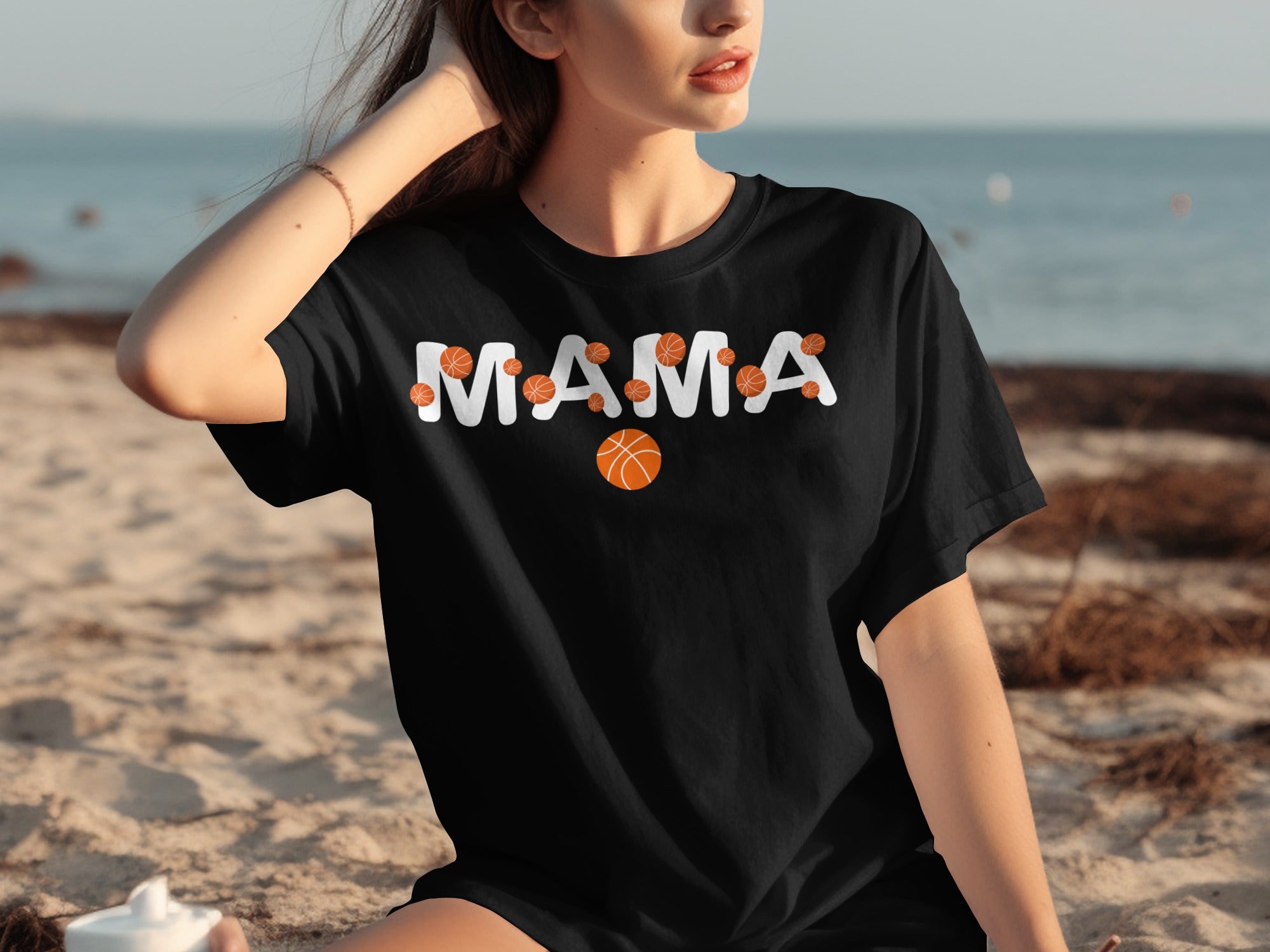 Black t-shirt with "MAMA" text and basketball graphics.
