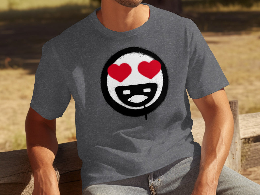 Dark gray t-shirt with a spray-painted smiley face with red hearts for eyes.