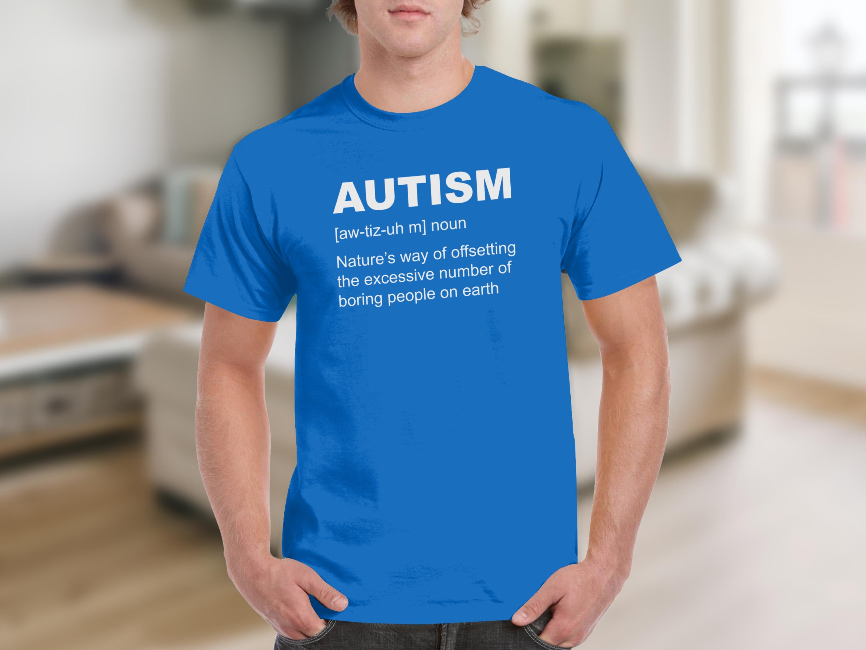 Blue t-shirt with white text defining "AUTISM" with a humorous definition.